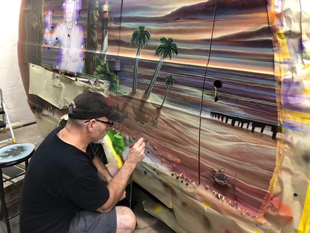 7. Ed Beard Painting a Van